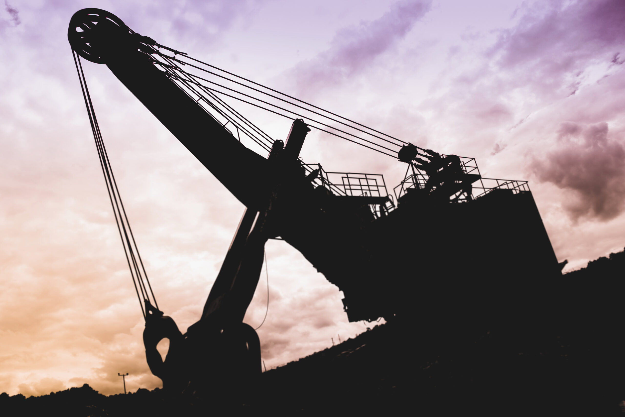 Silhouette excavators in coal mines