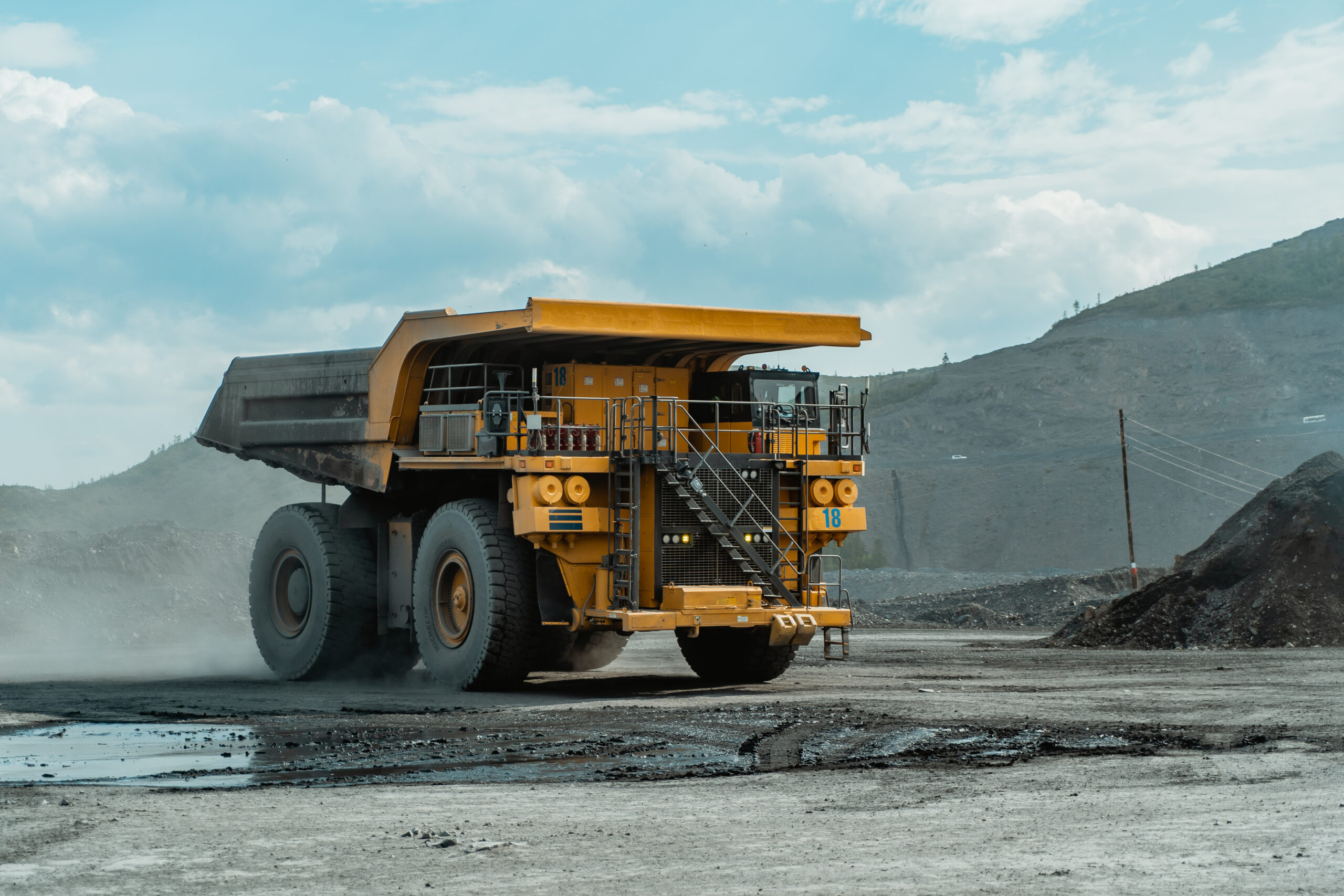 Career dump truck goes for loading.
